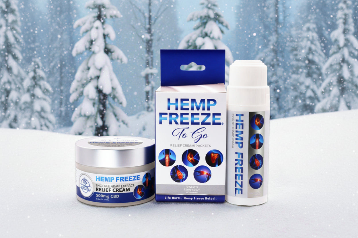 Hemp Freeze product set including cream, packets, and bottle against a snowy background